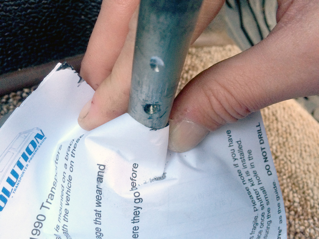 Covering assembly to catch drilled metal