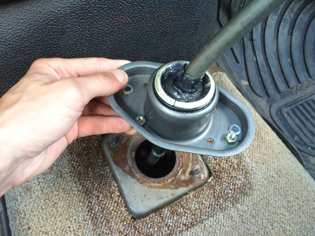 Undo nuts and slide assembly off lever