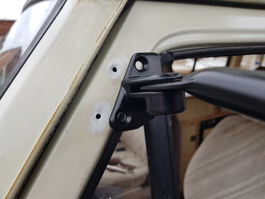 Painted holes for upper bracket screws